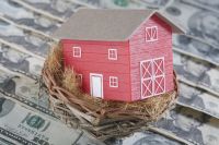 Jaką stawką ryczałtu i stawką VAT opodatkujesz sprzedaż domu?